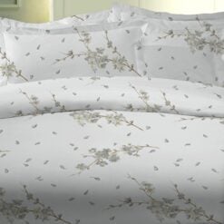 overtrek van dommelin met kleine decoratieve bloemetjes verspreid over het gehele oppervlak.